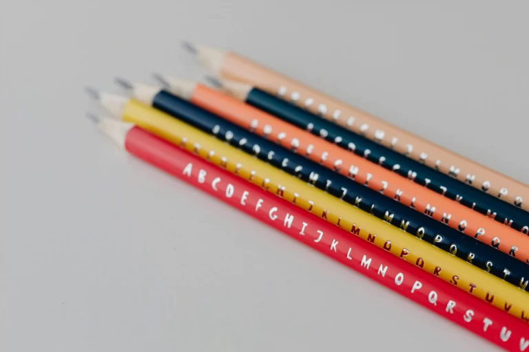 several pencils engraved with the alphabet