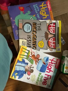 a pile of three Highlights magazines
