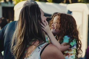 A mother and daughter smiling at each other representing that homeschooling requires parents to nurture the relationship with their child