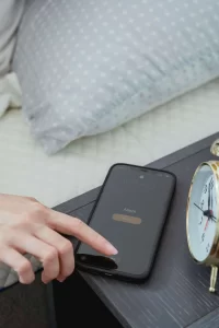 an iphone with the snooze alert going off