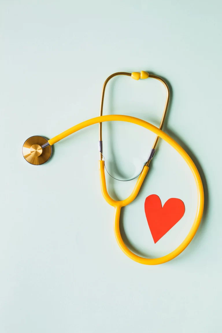 a doctor's stethoscope and a red heart