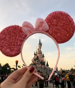 Pink Minnie Mouse ears representing affordable Disney souvenirs