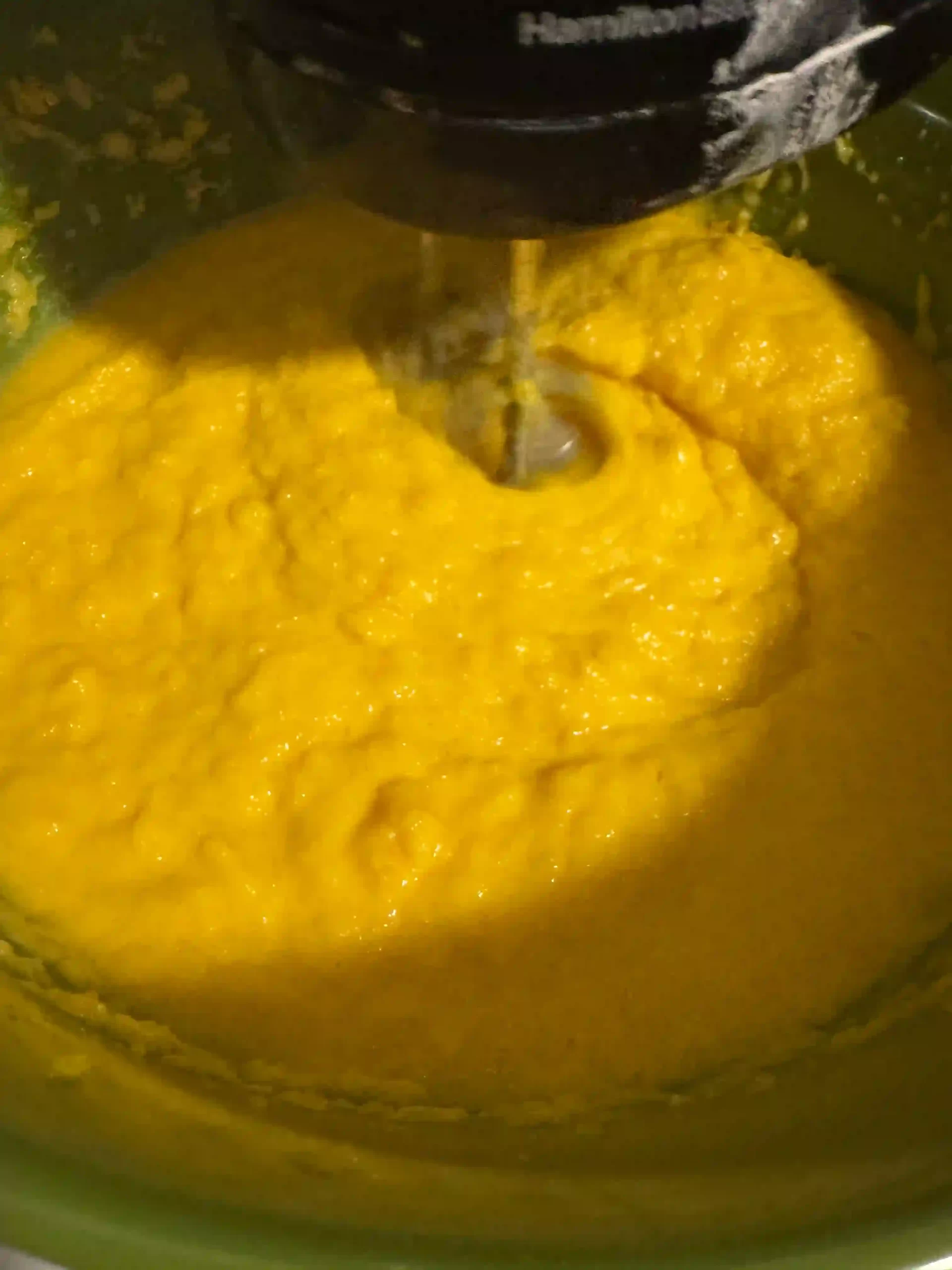 A bowl of pie pumpkin filling for a made from scratch pumpkin pie